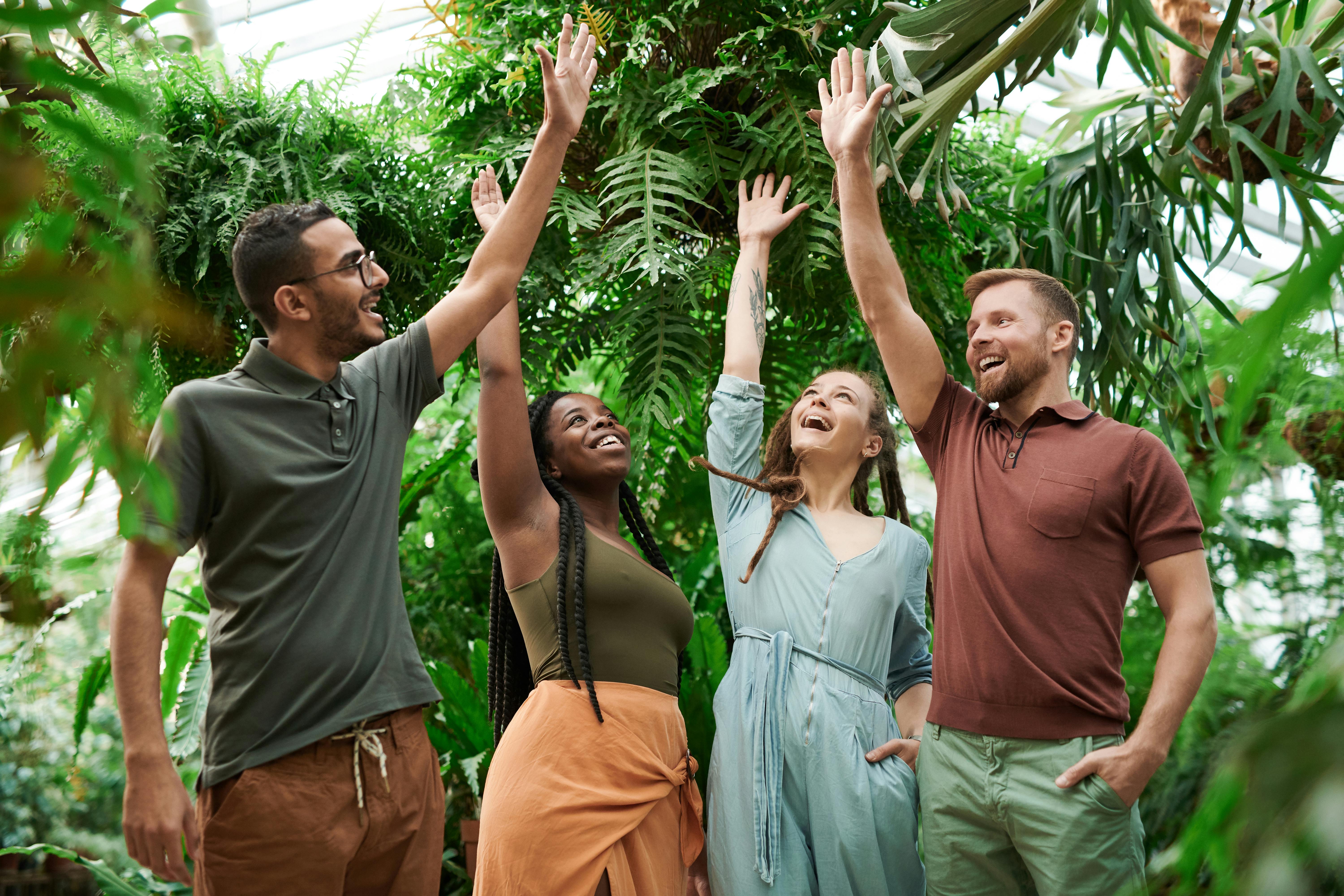 Team celebrating in nature